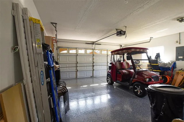 an aerial view of a house with a lake view