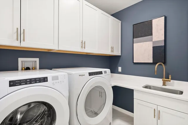a view of a balcony with wooden floor and outdoor seating