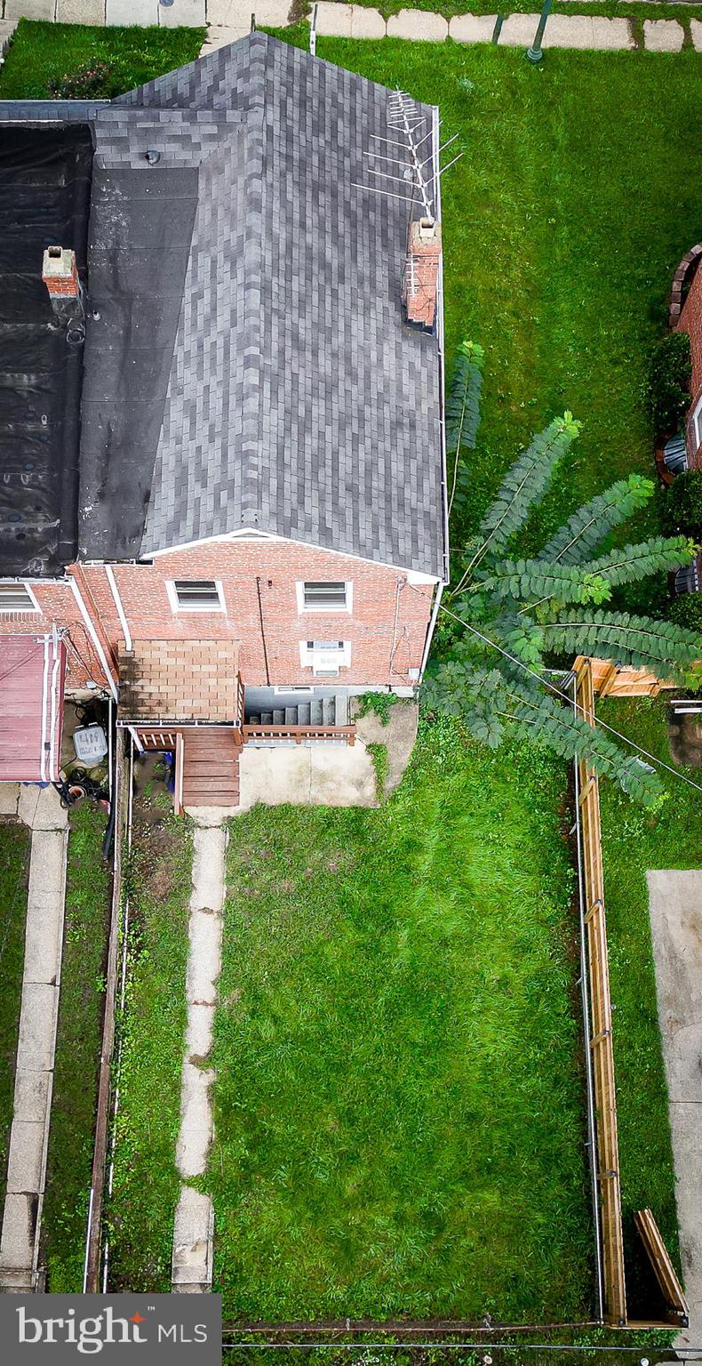 417 Random Road Baltimore, MD 21229 - Photo 26 of 32 an aerial view of a house with a garden
