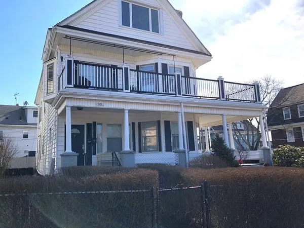 a view of a building with a porch