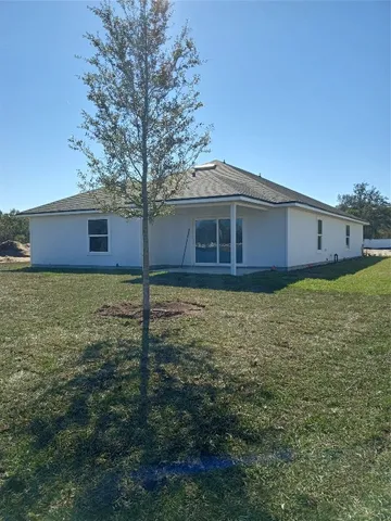 a house view with a garden space