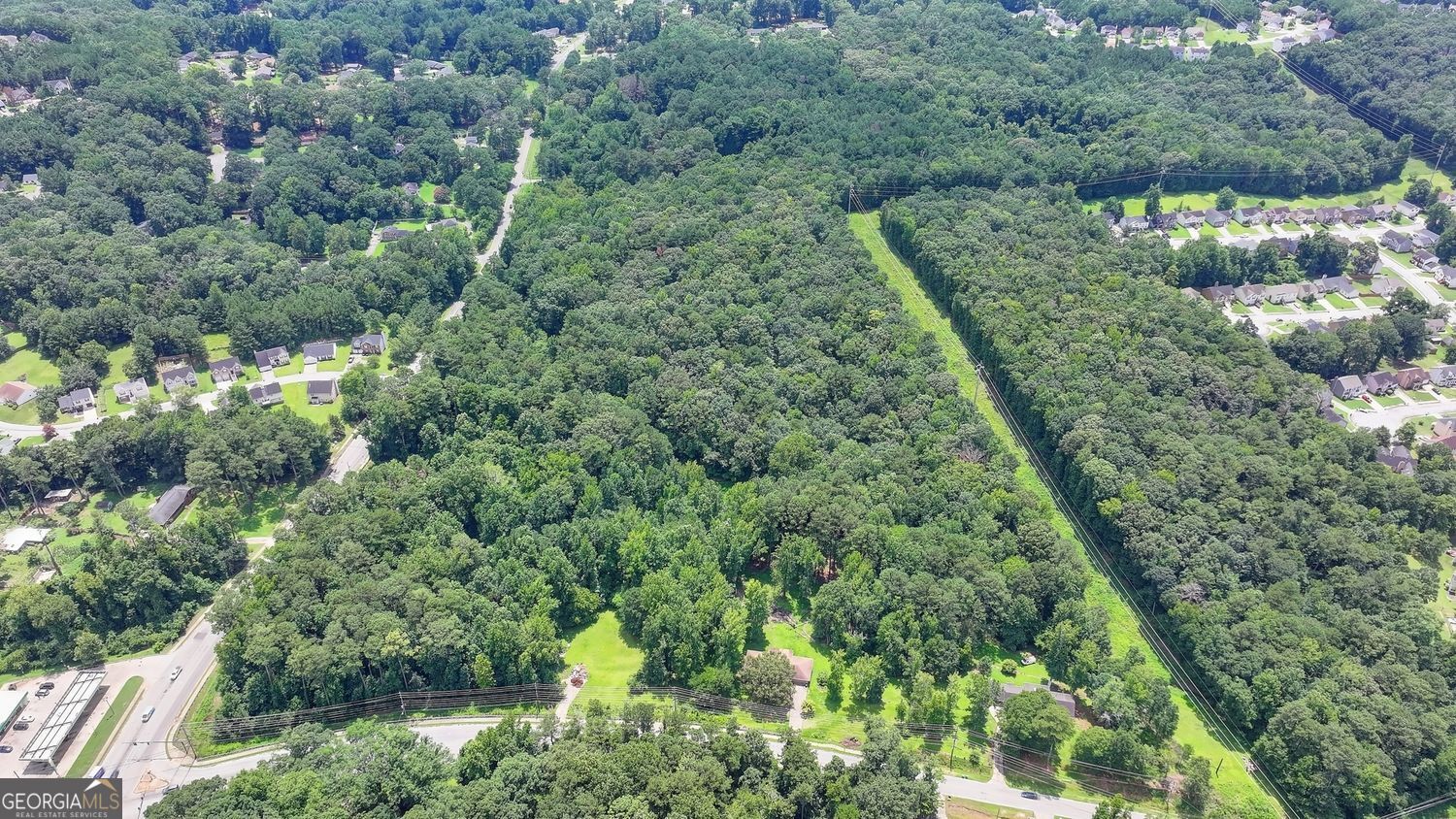3825 Panthersville Road Ellenwood, GA 30294 - Photo 5 of 15 an aerial view of a house with a yard