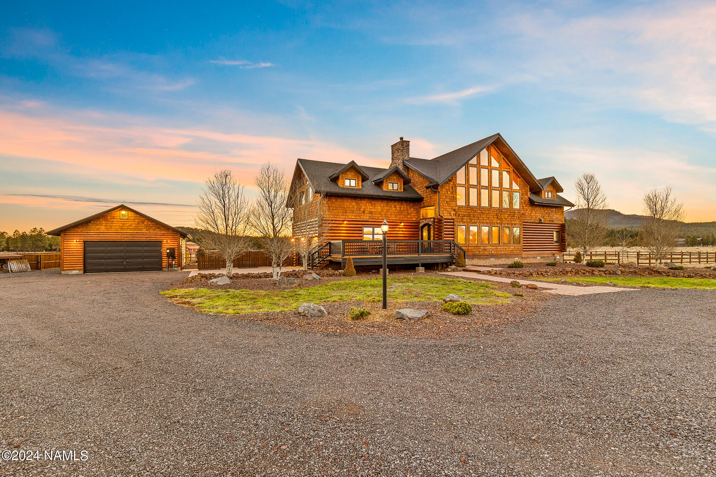 a view of a house with swimming pool