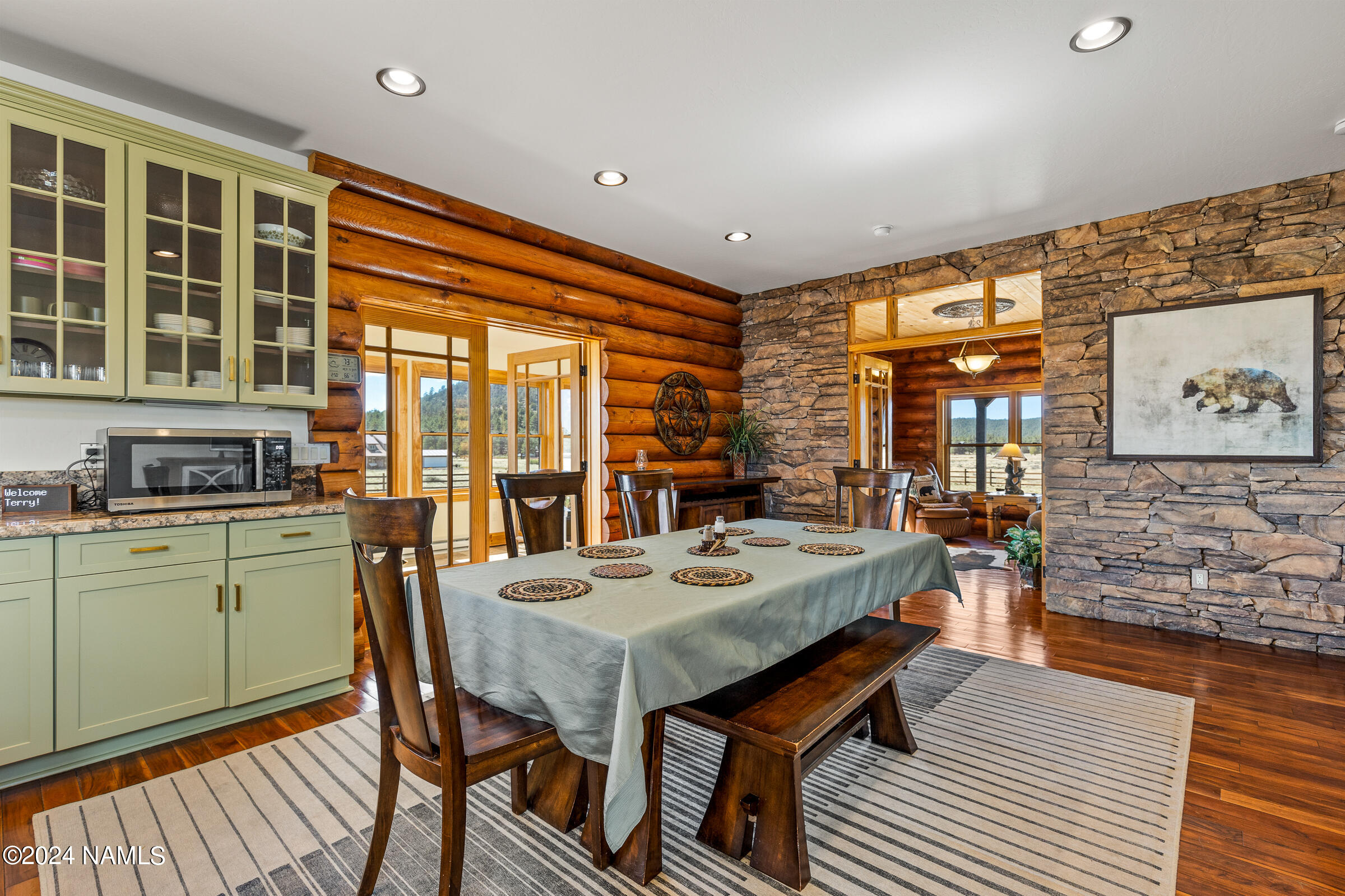 3130 North Spring Valley Road Parks, AZ 86018 - Photo 12 of 48 a view of a dining room with furniture and window