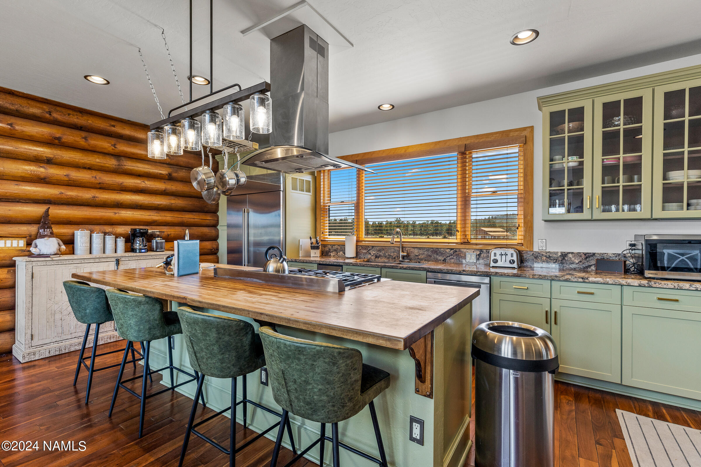 3130 North Spring Valley Road Parks, AZ 86018 - Photo 14 of 48 a view of a dining room with furniture and window