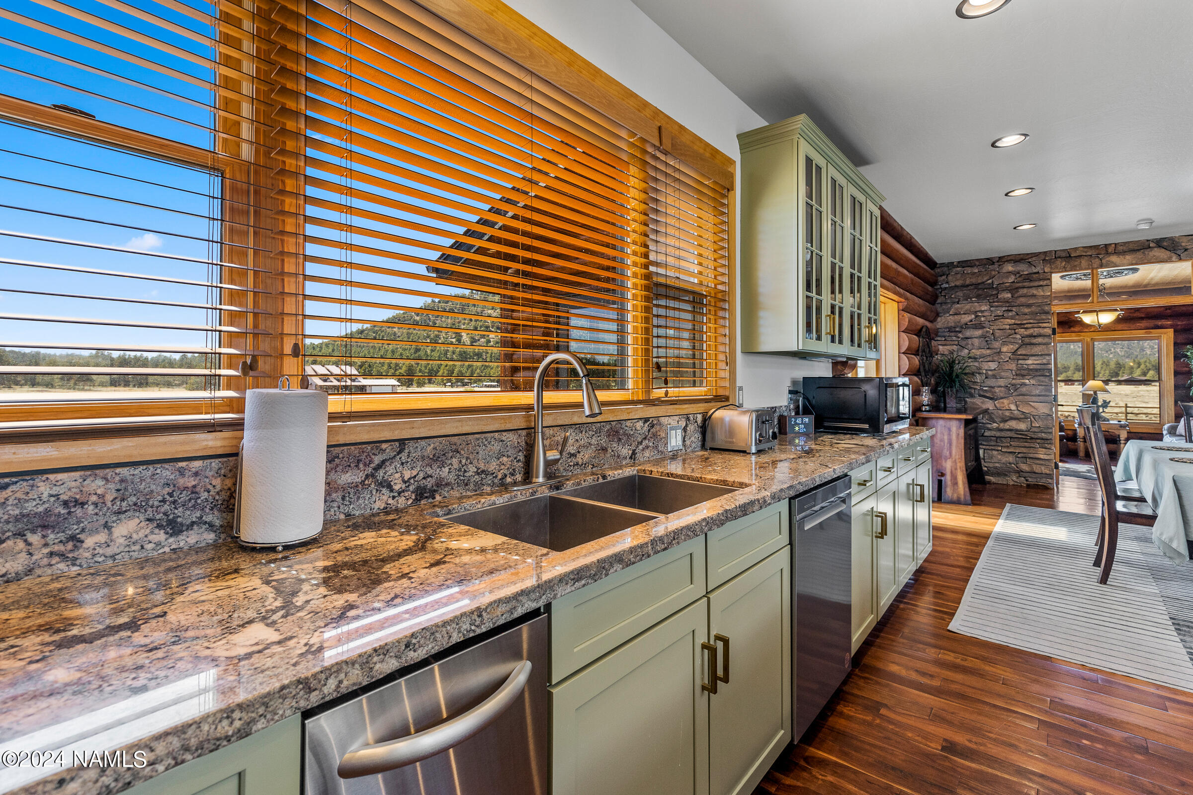 3130 North Spring Valley Road Parks, AZ 86018 - Photo 16 of 48 a kitchen with sink and cabinets