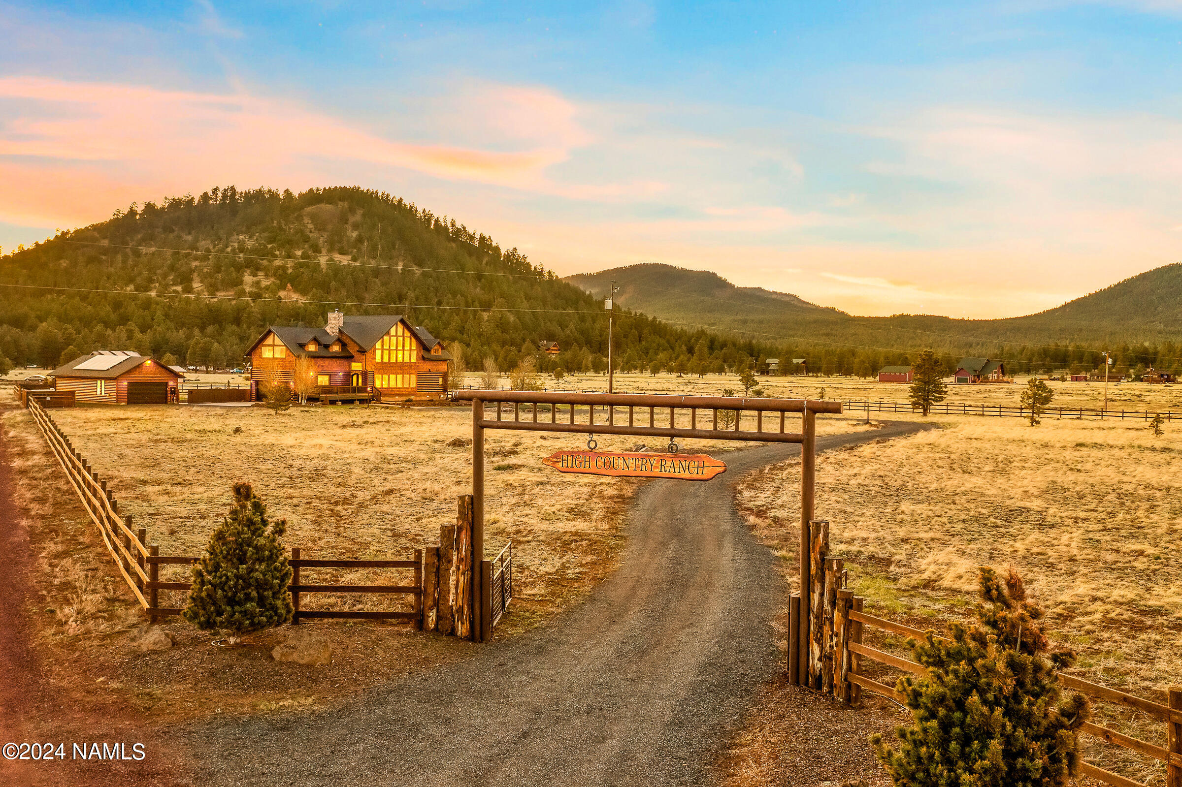 3130 North Spring Valley Road Parks, AZ 86018 - Photo 2 of 48 a view of a lake with a mountain