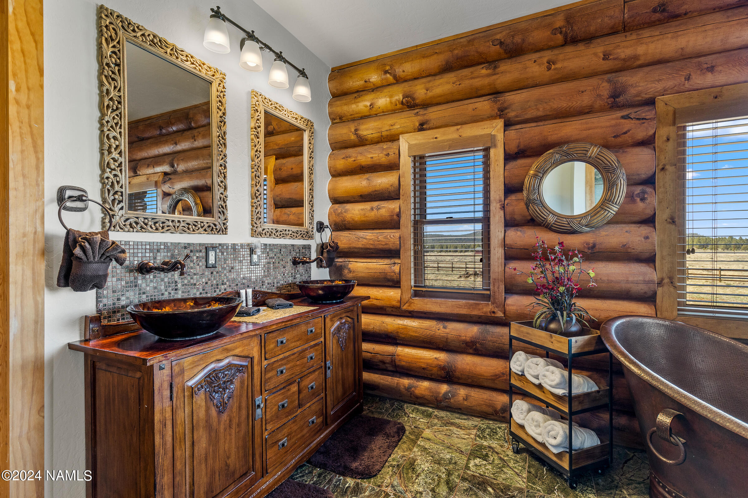 3130 North Spring Valley Road Parks, AZ 86018 - Photo 24 of 48 a kitchen with stainless steel appliances granite countertop a stove a sink and a granite counter tops with a large window