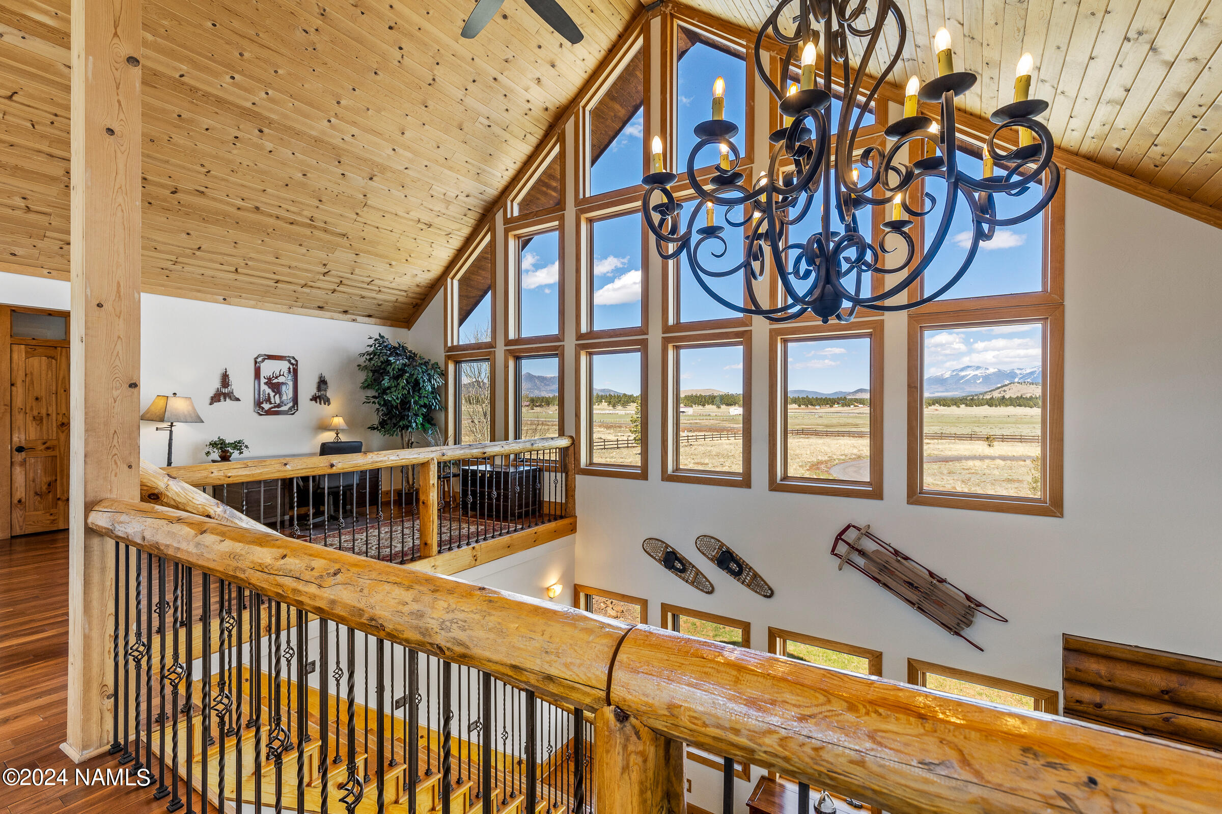 3130 North Spring Valley Road Parks, AZ 86018 - Photo 27 of 48 a living room with furniture and a large window