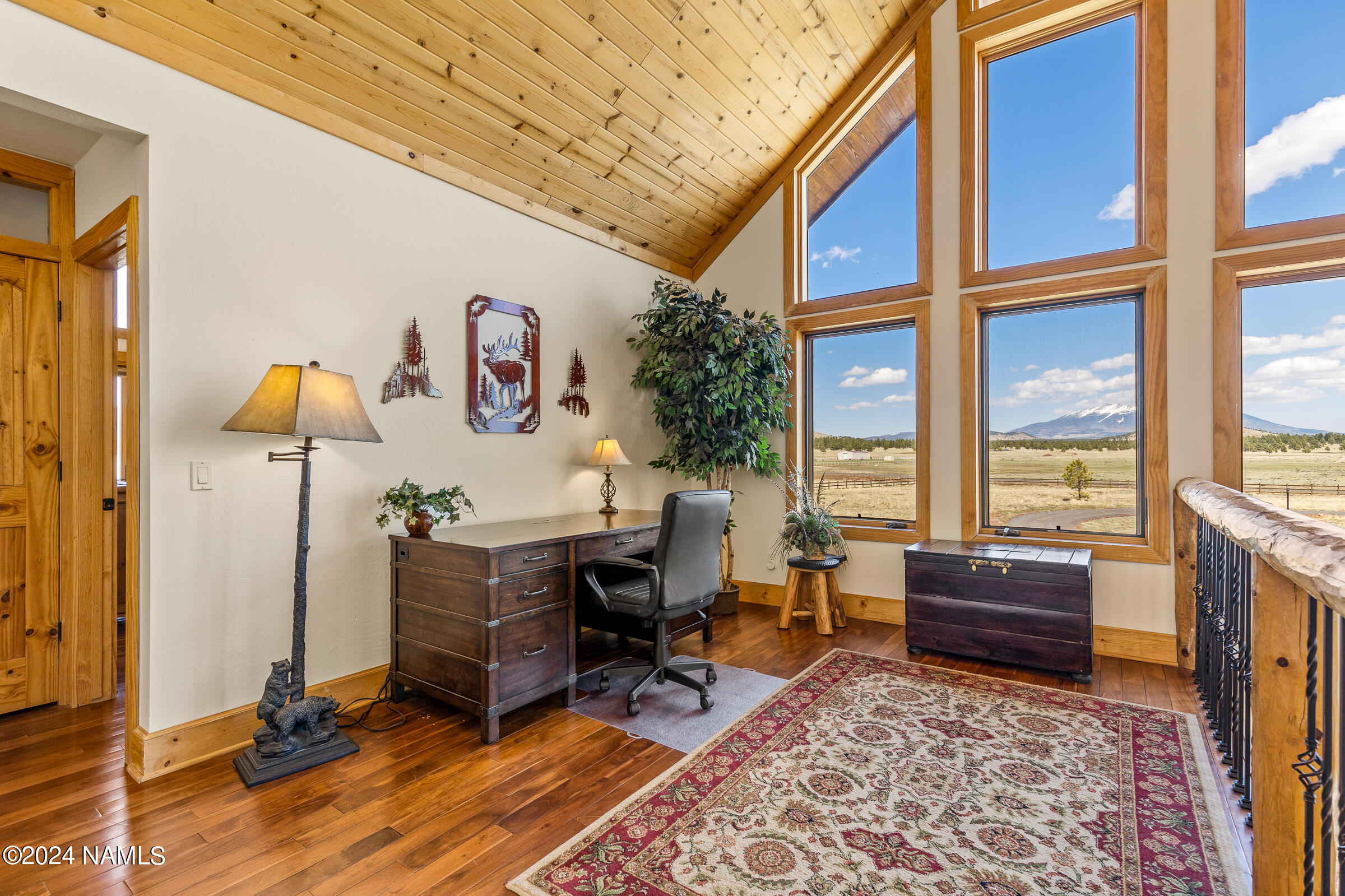 3130 North Spring Valley Road Parks, AZ 86018 - Photo 30 of 48 a living room with furniture and a window