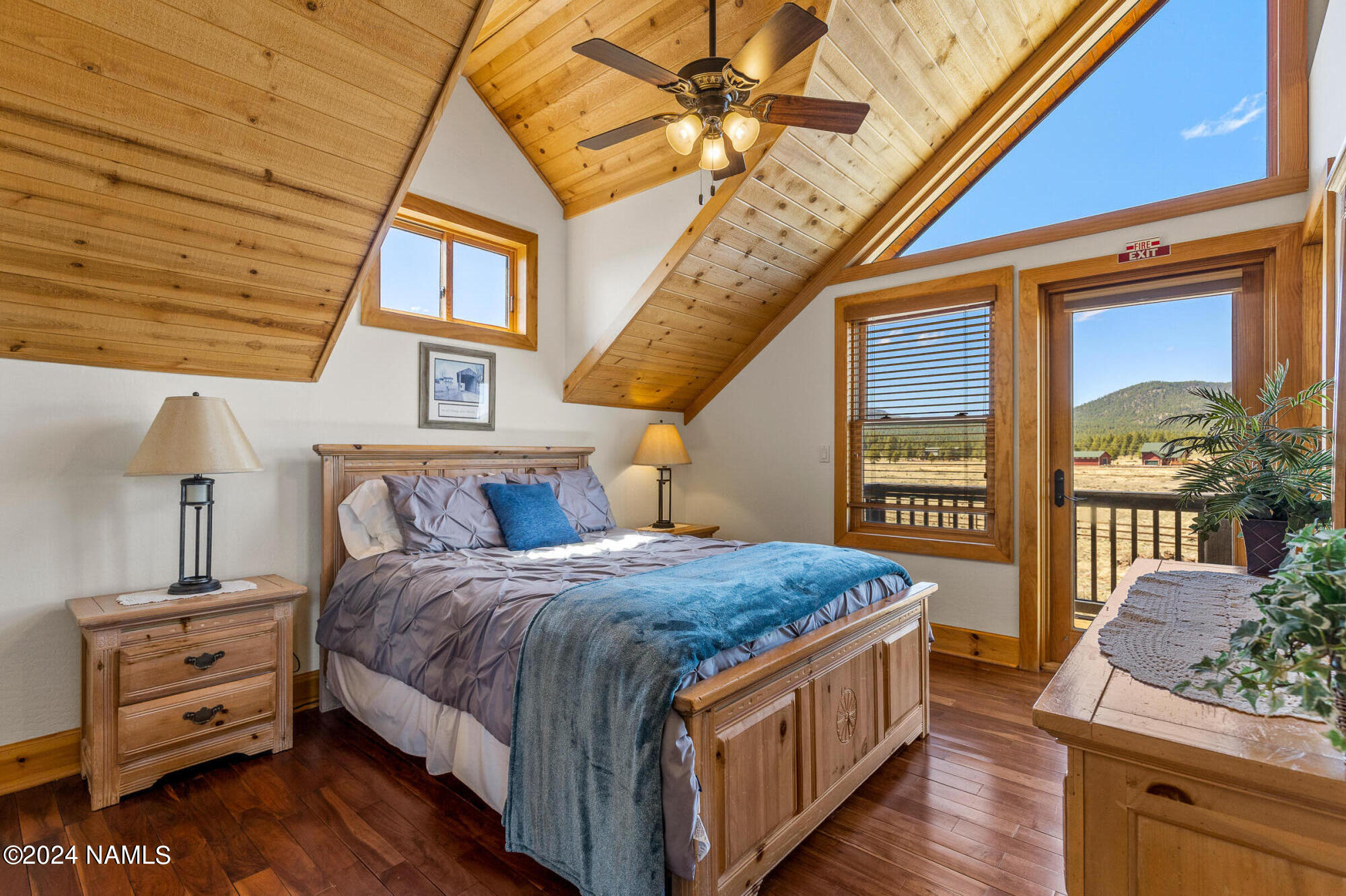 3130 North Spring Valley Road Parks, AZ 86018 - Photo 38 of 48 a bedroom with a bed and a dresser