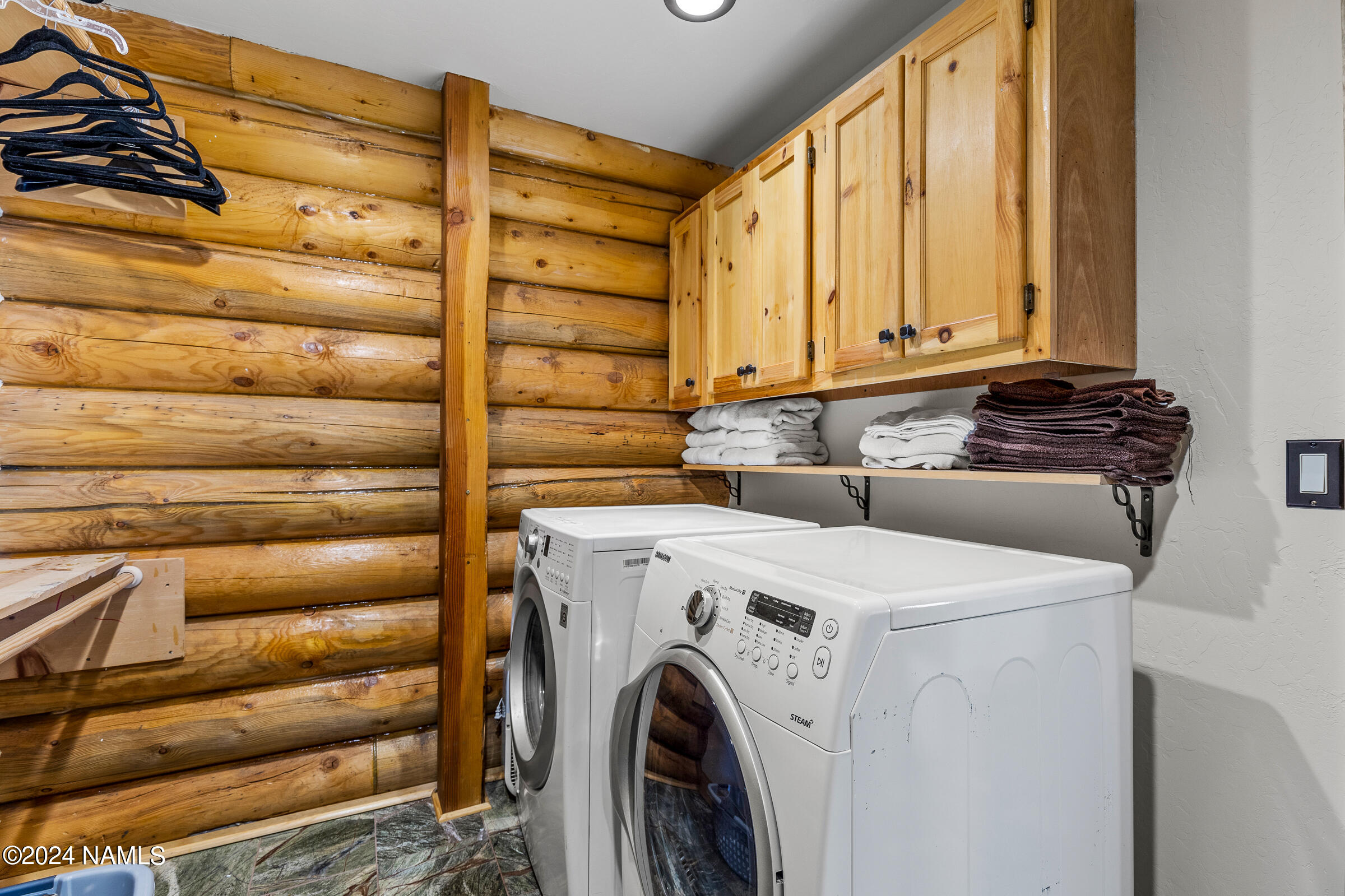 3130 North Spring Valley Road Parks, AZ 86018 - Photo 46 of 48 a utility room with dryer and washer