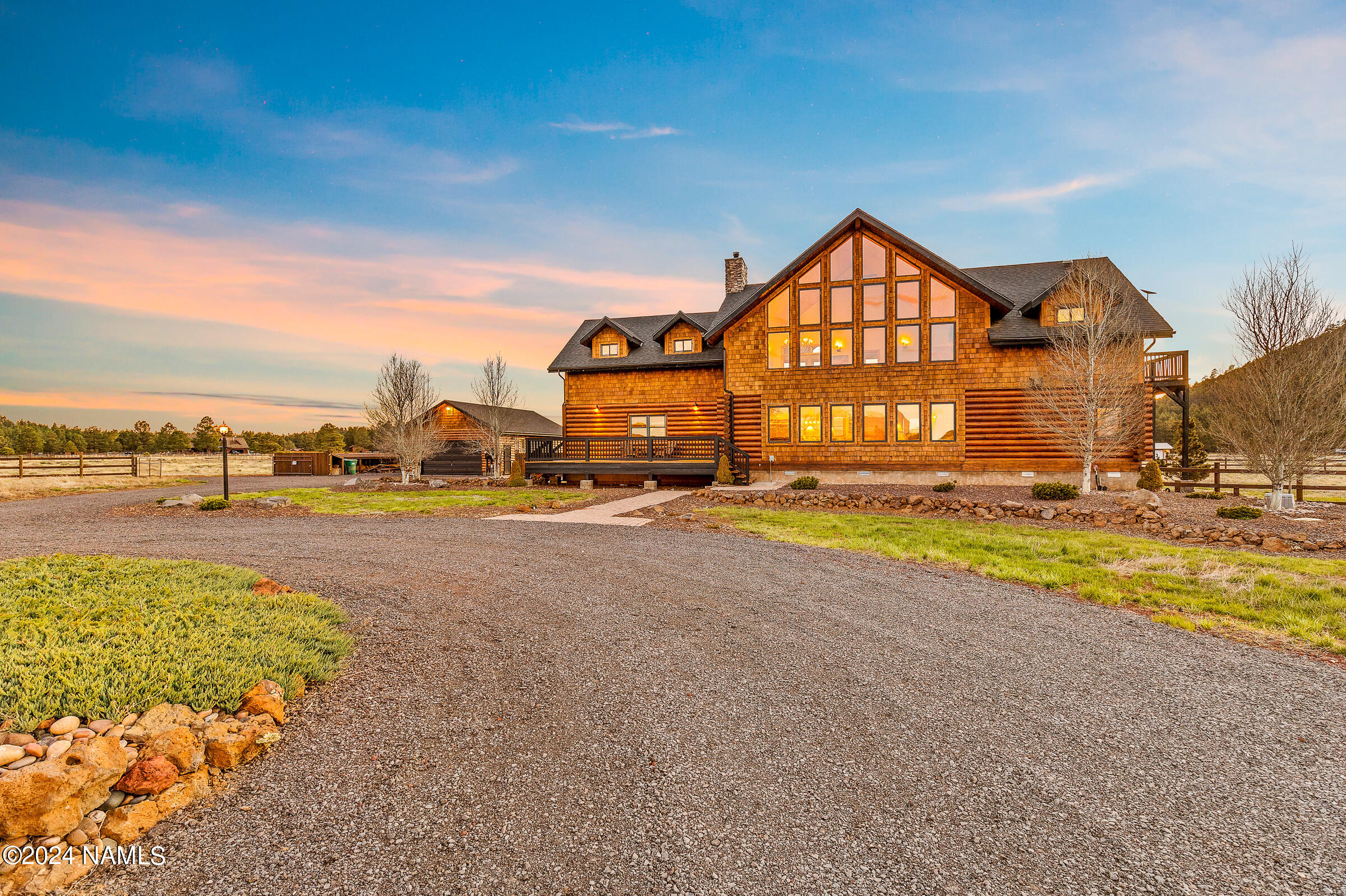 3130 North Spring Valley Road Parks, AZ 86018 - Photo 5 of 48 a view of swimming pool in front of residential houses