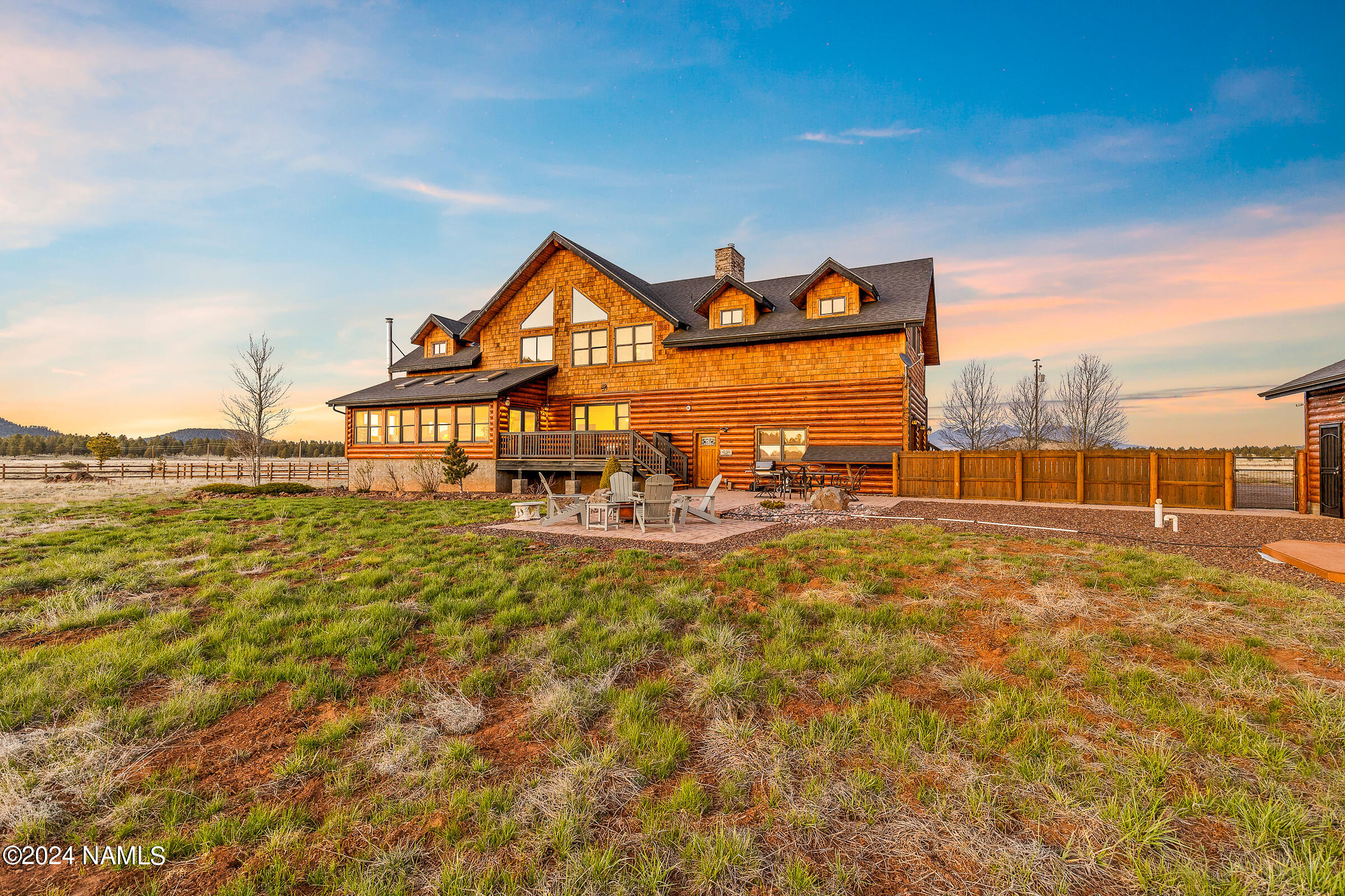 3130 North Spring Valley Road Parks, AZ 86018 - Photo 6 of 48 a view of a lake with a garden