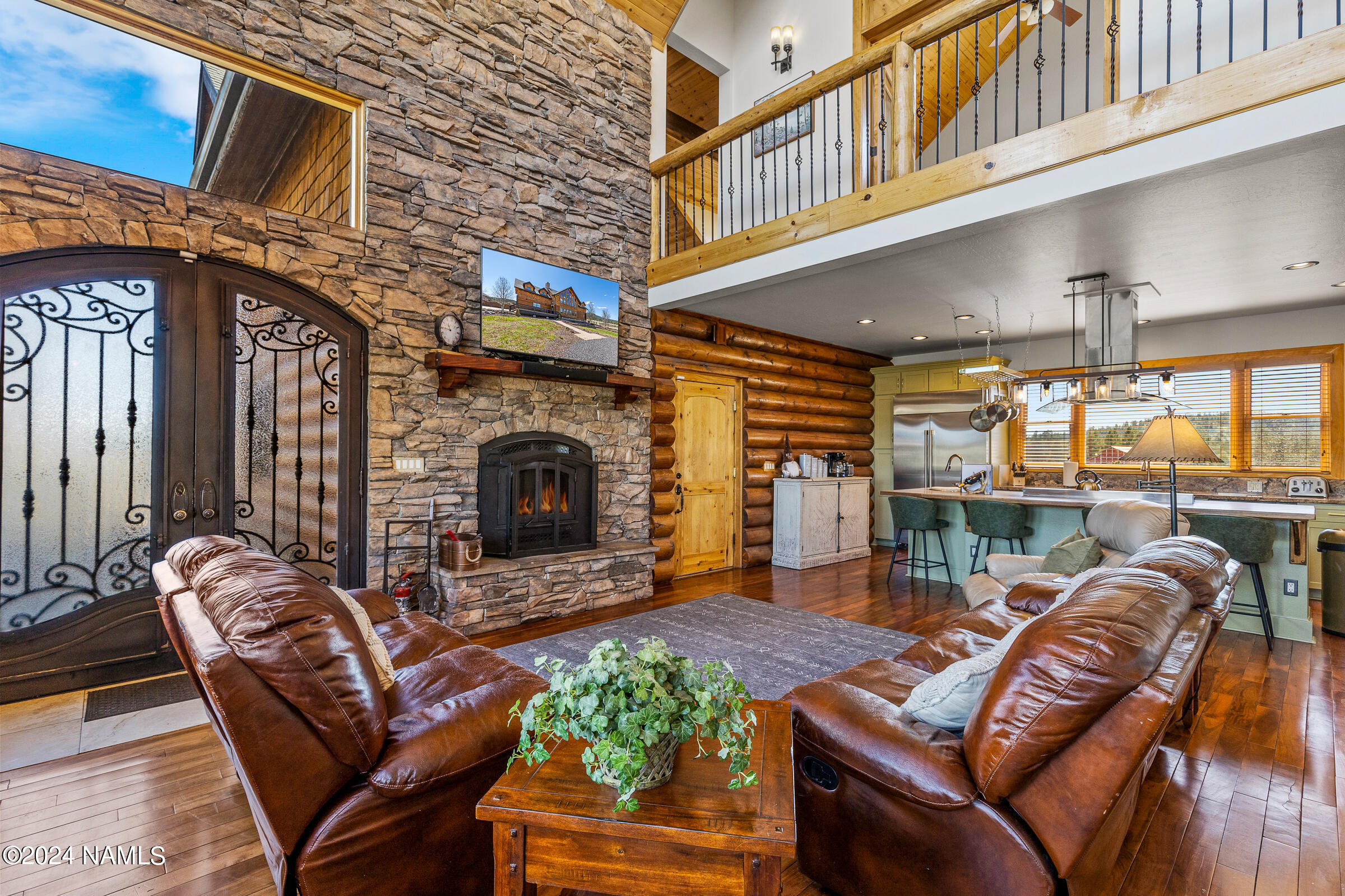 3130 North Spring Valley Road Parks, AZ 86018 - Photo 9 of 48 a balcony with furniture