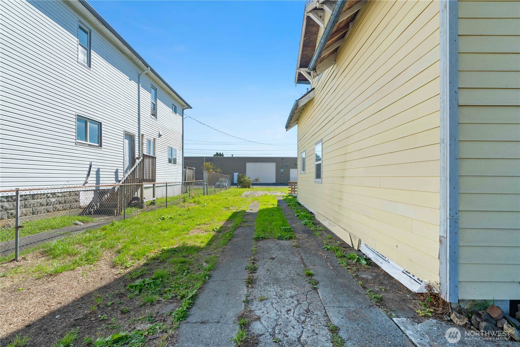 515 West 1st Street Aberdeen, WA 98520 - Photo 26 of 33 a view of a house with a yard