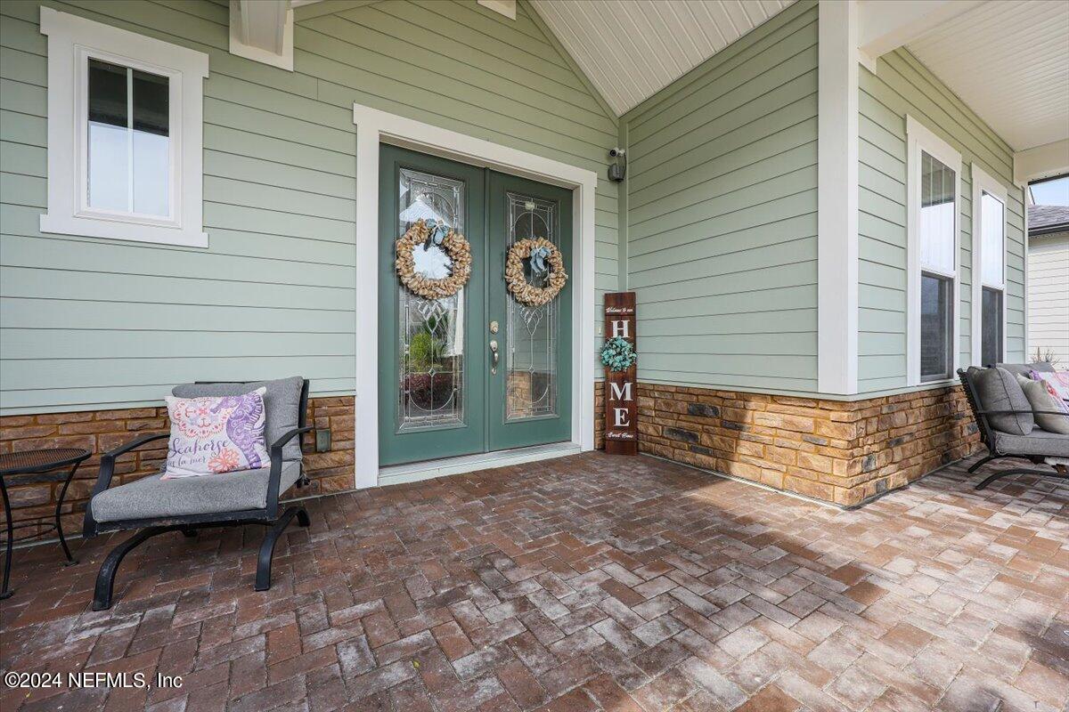 a view of a bench in front of house