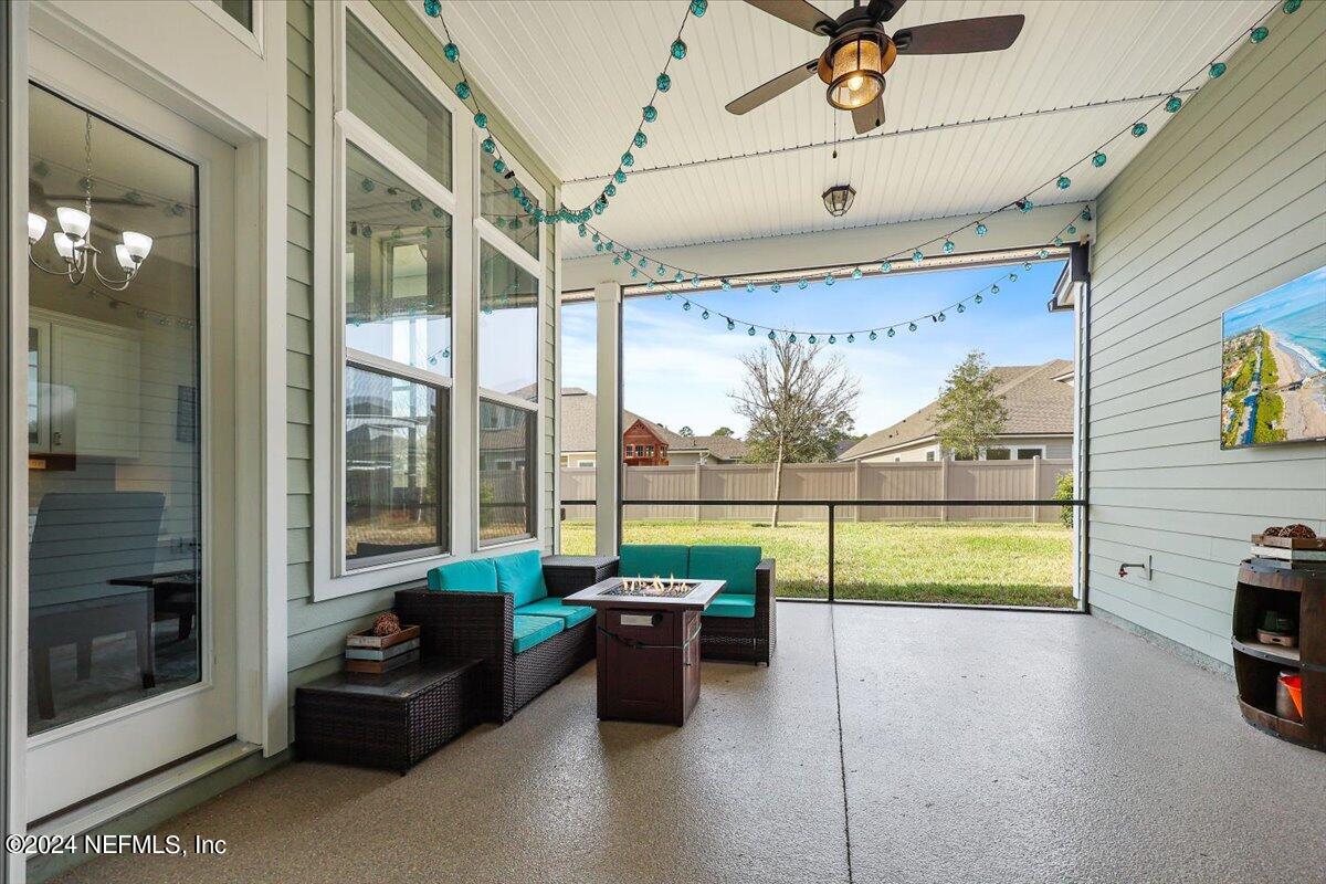 778 Glenneyre Circle St. Augustine, FL 32092 - Photo 22 of 40 a view of a floor with a table and chairs