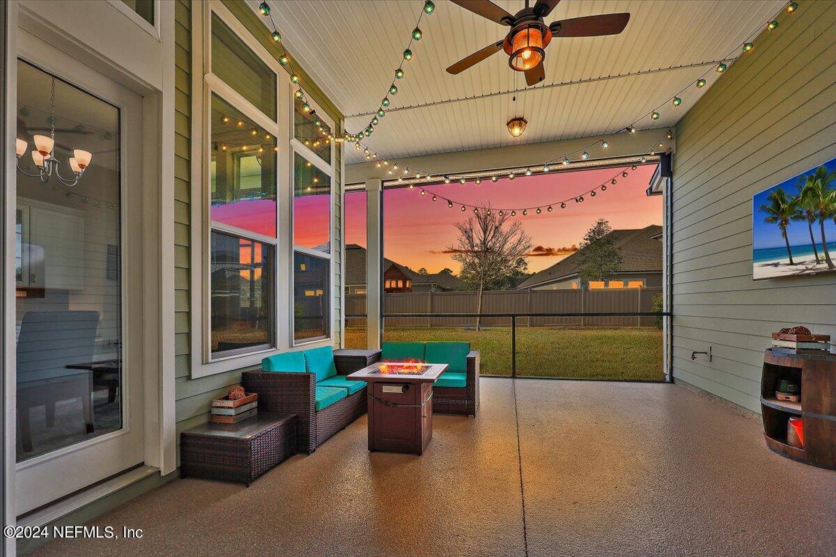 778 Glenneyre Circle St. Augustine, FL 32092 - Photo 24 of 40 a roof deck with table and chairs