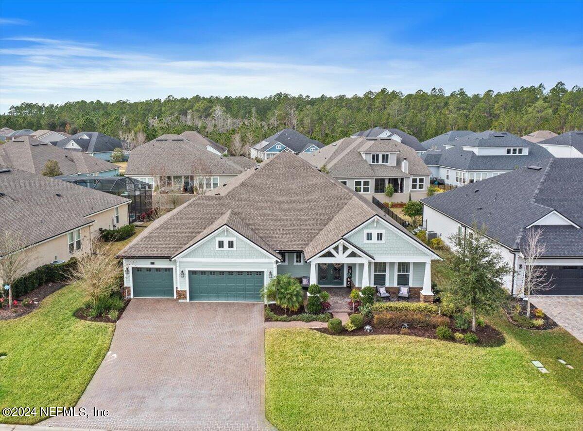 778 Glenneyre Circle St. Augustine, FL 32092 - Photo 25 of 40 a front view of a house with a yard