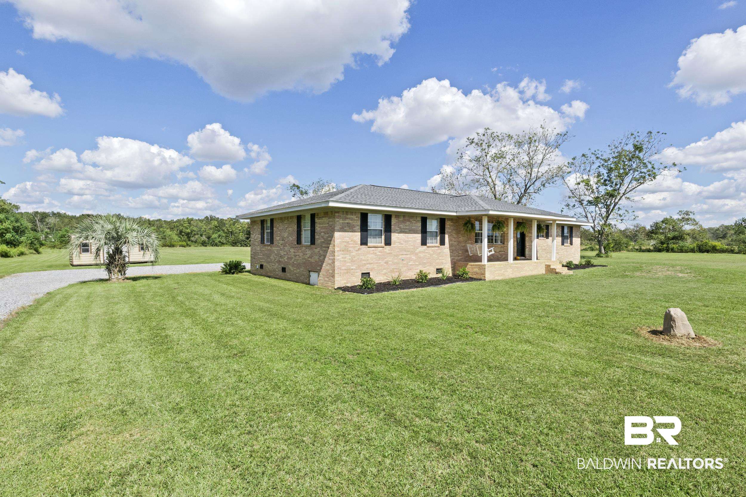 17689 Brewer Road Foley, AL 36535 - Photo 41 of 54 View of front facade featuring a front lawn