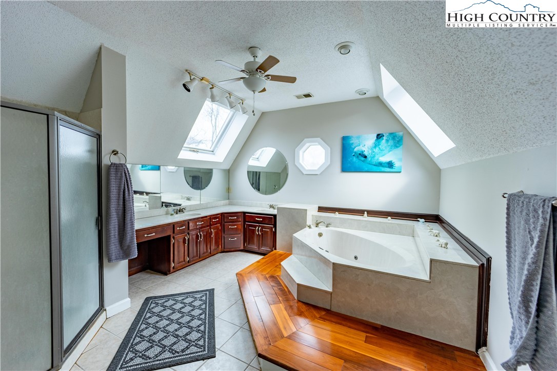 346 Clear View Ridge Crumpler, NC 28617 - Photo 25 of 41 a kitchen with stainless steel appliances granite countertop a sink a stove and a refrigerator