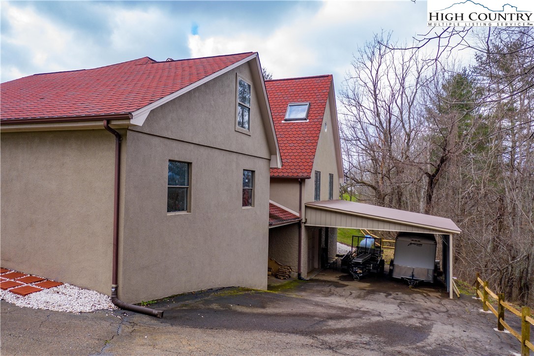 346 Clear View Ridge Crumpler, NC 28617 - Photo 39 of 41 a front view of a house with parking space