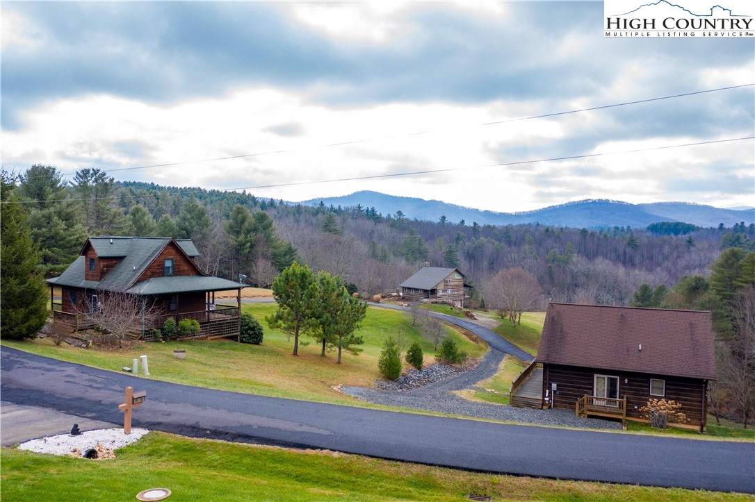 346 Clear View Ridge Crumpler, NC 28617 - Photo 6 of 41 an aerial view of a house with a garden