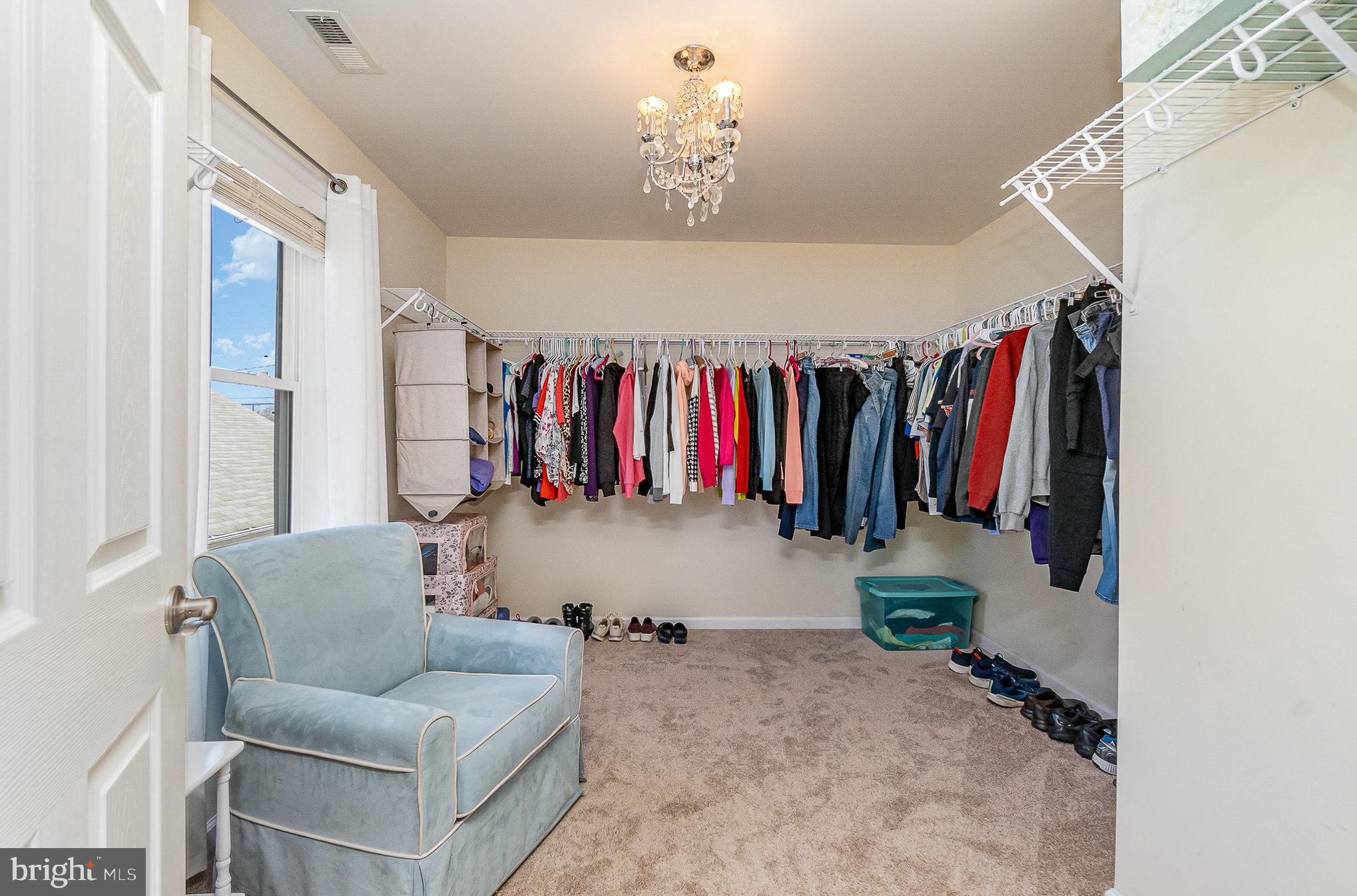 332 Miles Essex, MD 21221 - Photo 17 of 45 a view of walk in closet with clothes and shoes