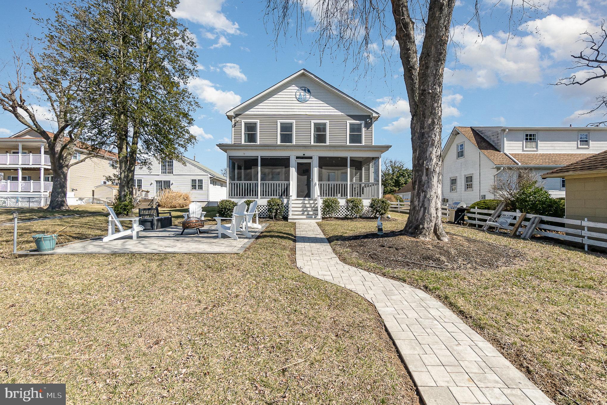 332 Miles Essex, MD 21221 - Photo 33 of 45 a front view of a house with swimming pool and sitting area