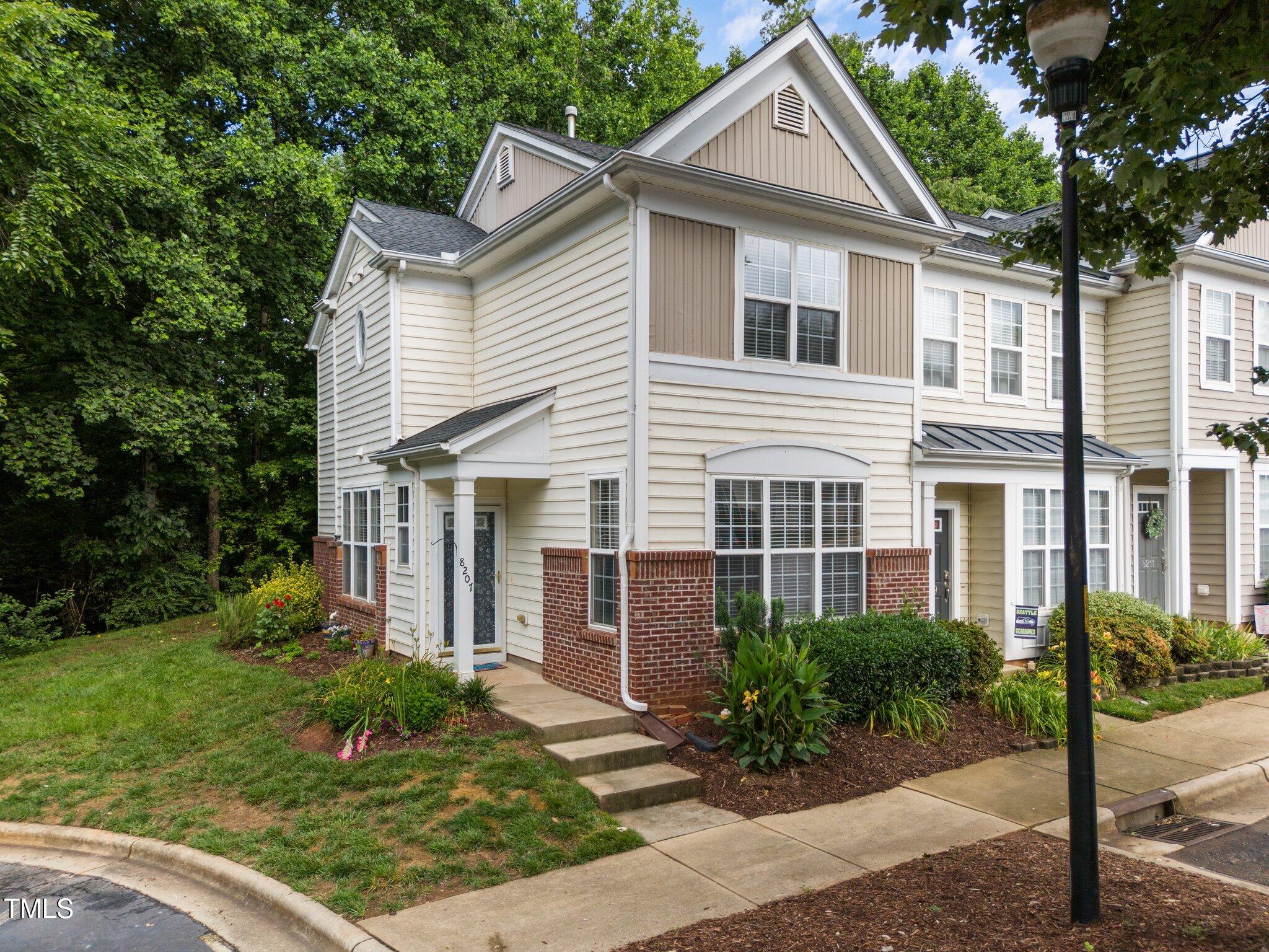 8207 City Loft Court Raleigh, NC 27613 - Photo 1 of 24 1-web-or-mls-DJI_20250606092355_0452_D