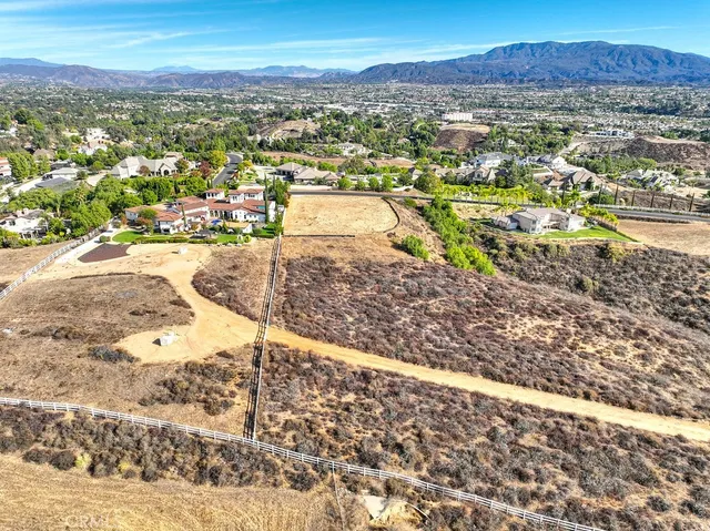 a view of a city with mountains in the background