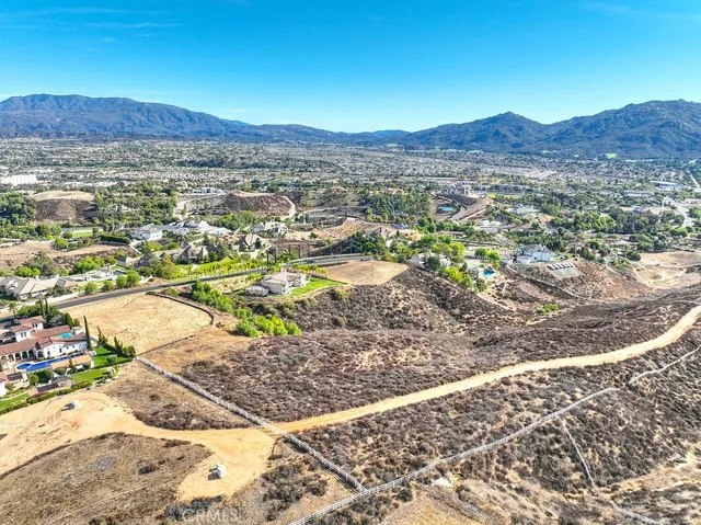 an aerial view of residential house and green space