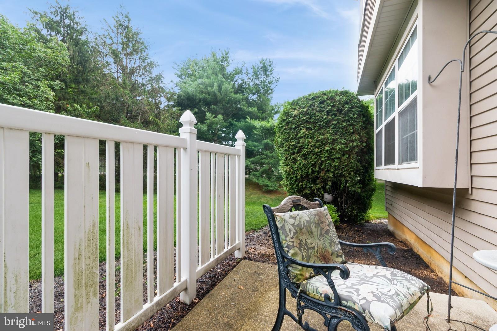 104 Coventry Way Mount Laurel, NJ 08054 - Photo 22 of 23 a view of a chair and table in the balcony