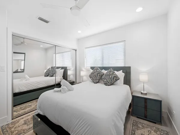 a bathroom with a bathtub and shower