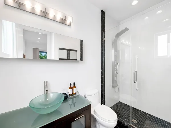 a view of a workspace with furniture and a couch