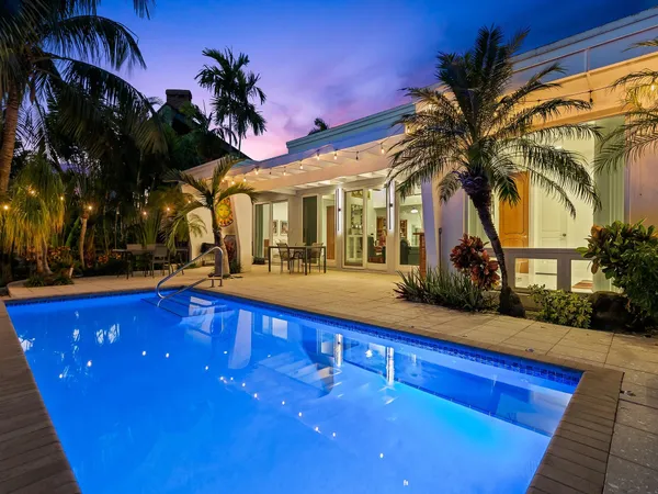 a view of a building with a swimming pool