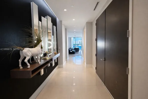 a view of living room with furniture and window