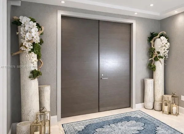 a bedroom with bed couch and window