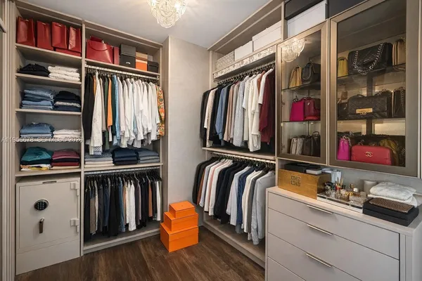 a bathroom with a bathtub shower sink and a toilet
