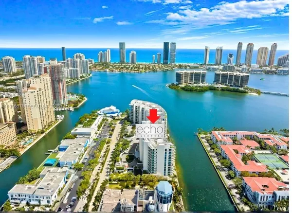 a view of a city with tall buildings in the background