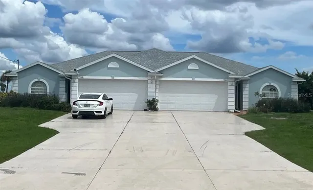 a house view with a garden space