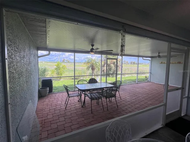 a bathroom with a double vanity sink tub and mirror