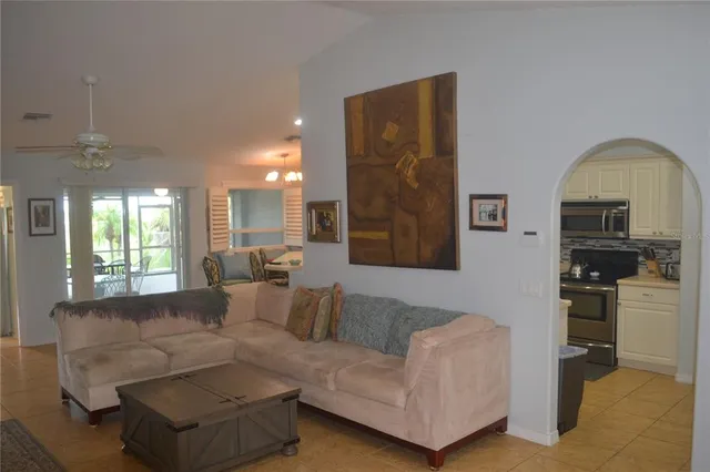 a kitchen that has a lot of cabinets in it
