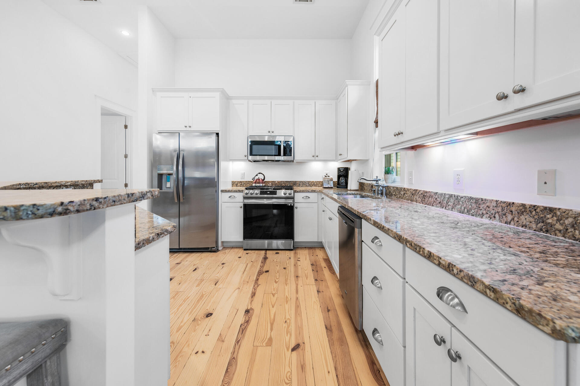 47 Cypress Walk Santa Rosa Beach, FL 32459 - Photo 19 of 46 a kitchen with stainless steel appliances granite countertop a sink stove and refrigerator