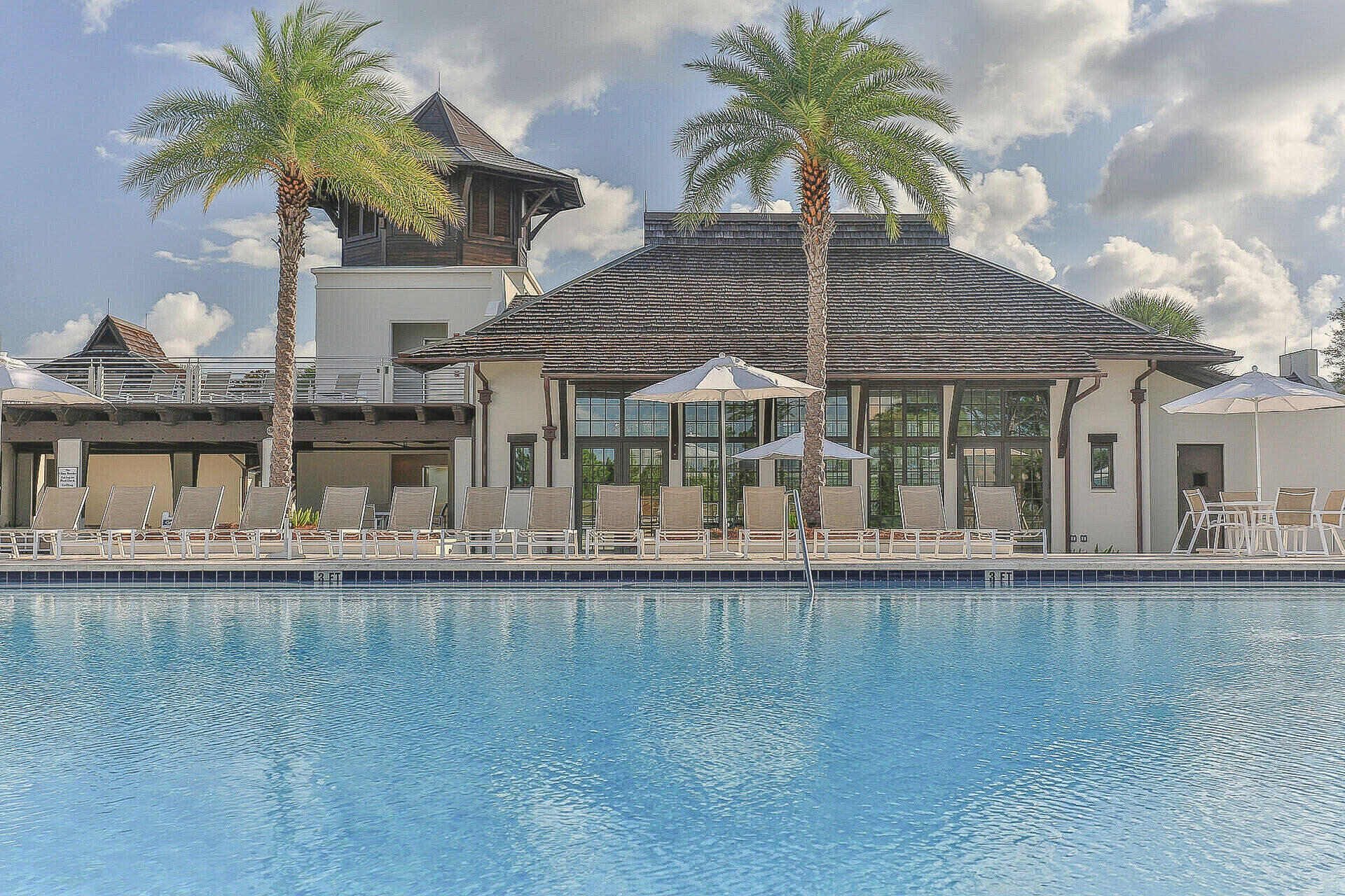 47 Cypress Walk Santa Rosa Beach, FL 32459 - Photo 30 of 46 a front view of a house with a garden and swimming pool