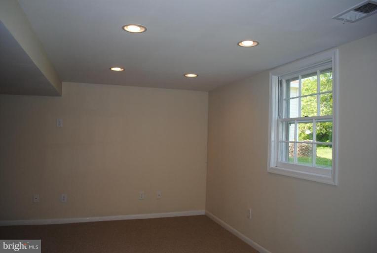 7804 Appletree Road Pasadena, MD 21122 - Photo 12 of 21 Finished Lower Level