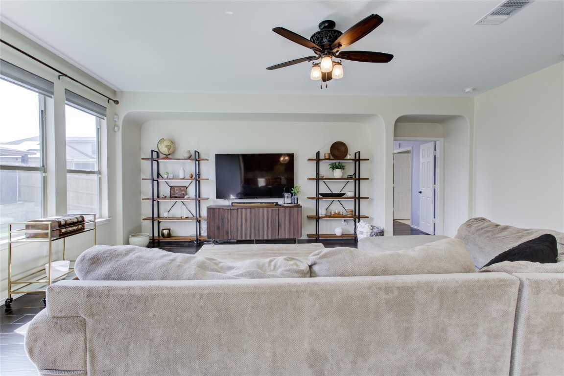920 Autumn Sage Way Pflugerville, TX 78660 - Photo 13 of 30 a living room with furniture and a flat screen tv