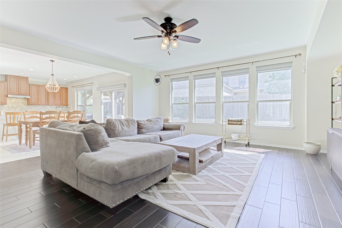 920 Autumn Sage Way Pflugerville, TX 78660 - Photo 16 of 30 a living room with furniture and a large window