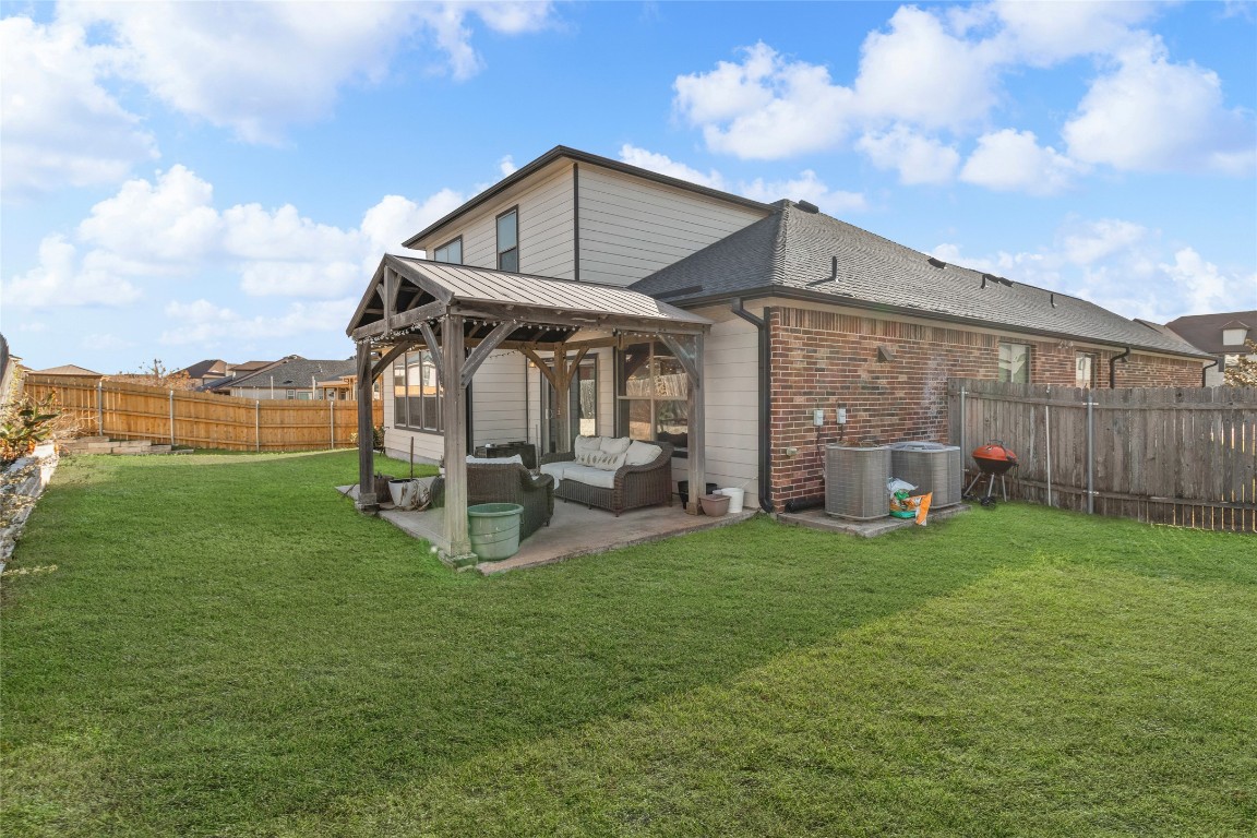 920 Autumn Sage Way Pflugerville, TX 78660 - Photo 28 of 30 a view of a house with backyard